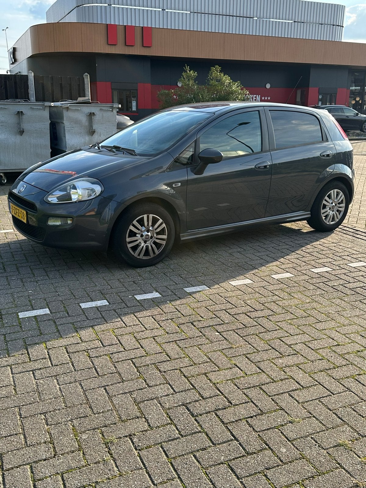 Fiat Punto 1.3 Multijet 59KW 5DR 2014 Grijs, Voorwielaandrijving, Stof, 4 cilinders, 400 kg