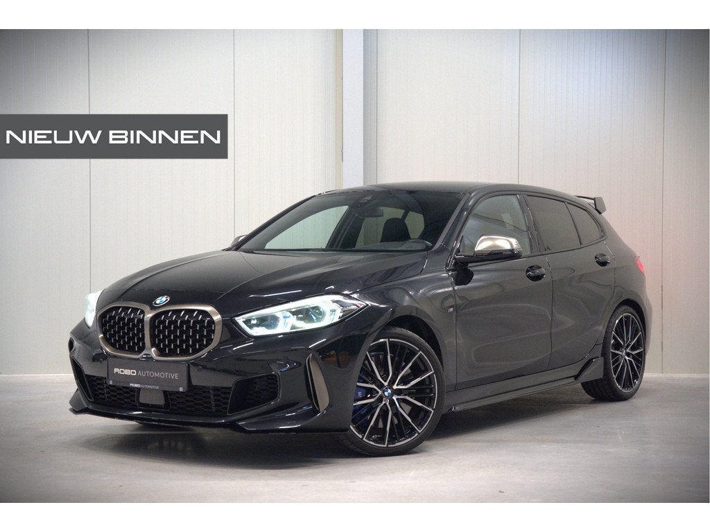 BMW 1-serie M135i xDrive High Executive Edition | M Performa, 1998 cc, Gebruikt, 4 cilinders, Leder en Stof