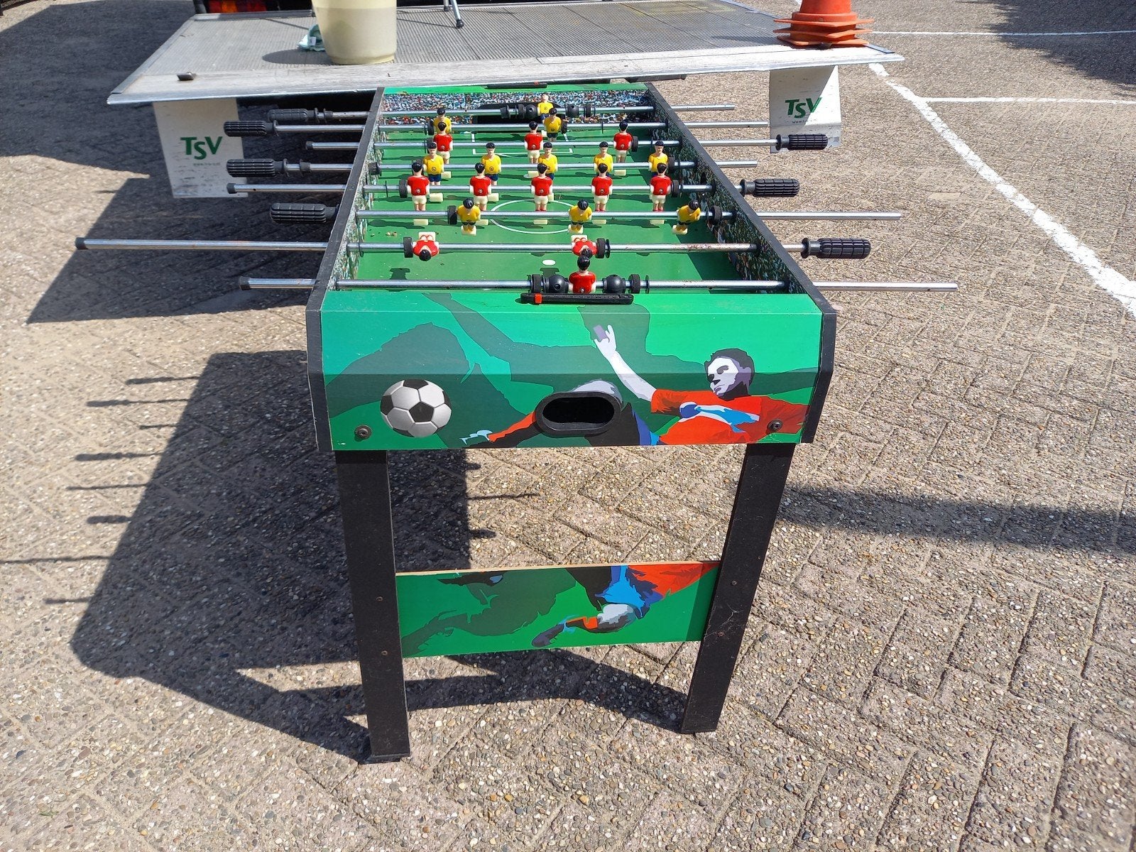 voetbaltafel, Ophalen