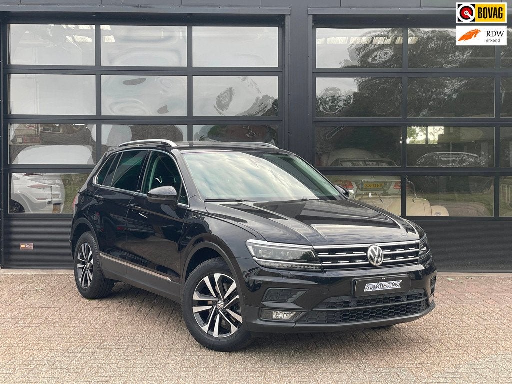 Volkswagen Tiguan 1.5 TSI Comfortline Business, Auto's, Stof, 4 cilinders, Zwart, Origineel Nederlands
