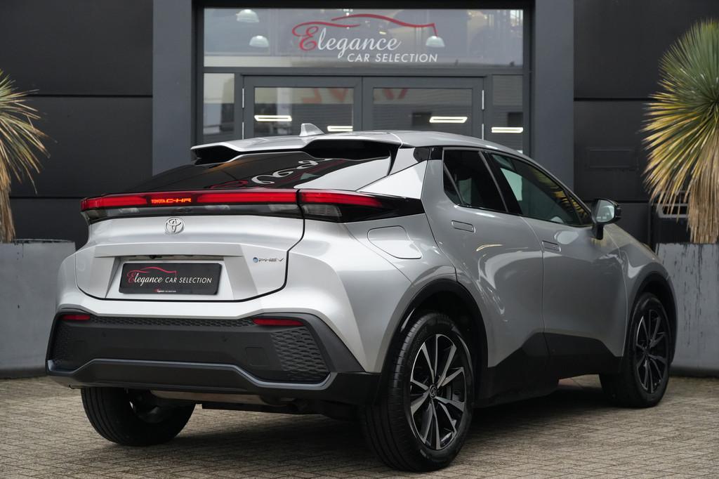 Toyota C-HR 2.0 Plug-in Hybrid 220 Dynamic 223pk Stoelverwar, Auto's, Toyota, Stof, 4 cilinders, 1645 kg, Bedrijf