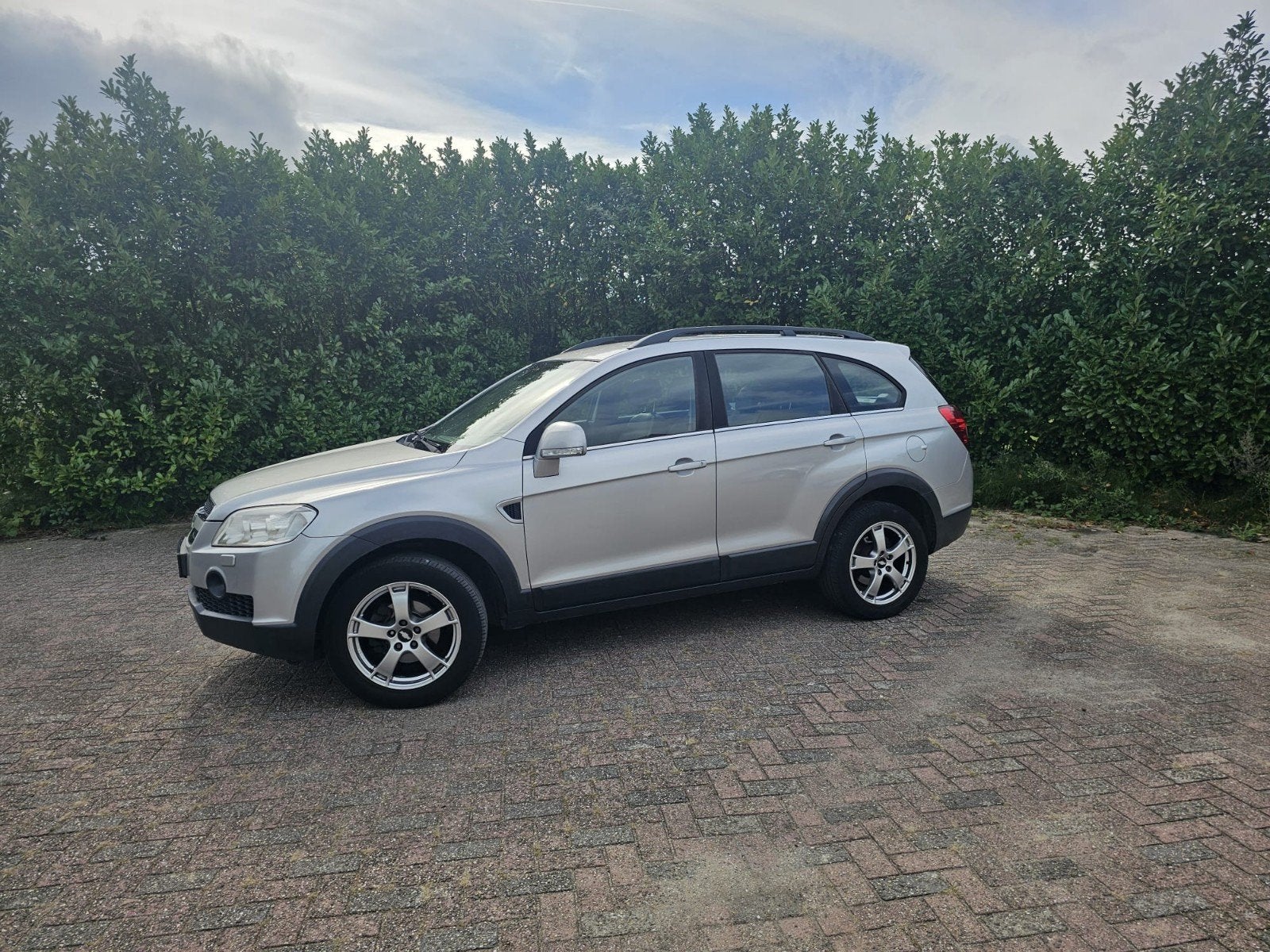 Chevrolet Captiva 3.2 4WD AUT 2008 Grijs APK 01-10-2027, 1780 kg, 3195 cc, 2000 kg, 7 stoelen
