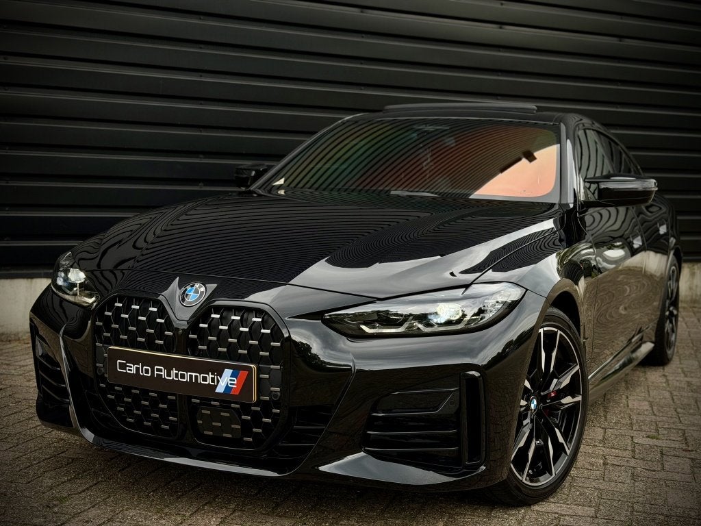 BMW 4 Serie Gran Coupé M440i xDrive DAK|HUD|360|H/K|MEMORY|, Auto's, 1800 kg, Zwart, Bedrijf, 2998 cc
