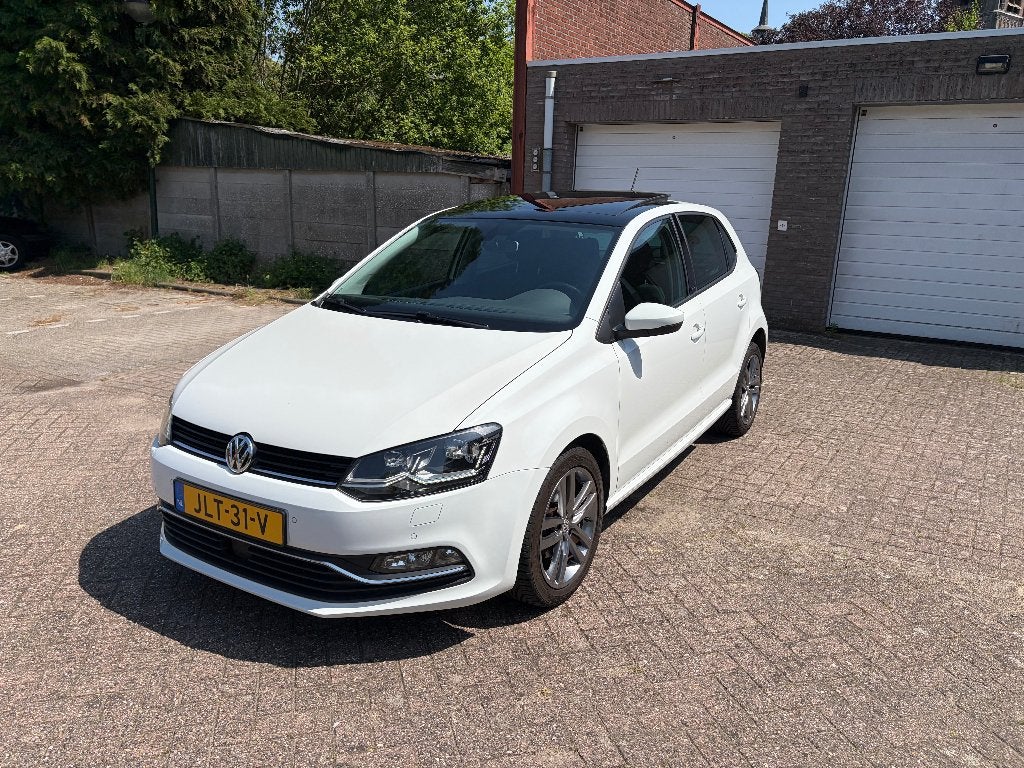 Volkswagen Polo 1.2 TSI 66KW 2016 Wit 90000 km, Auto's, Volkswagen, Adaptive Cruise Control, 4 cilinders, Wit, Handgeschakeld