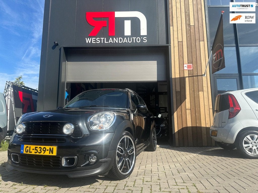 Mini Countryman 1.6 Cooper S All4 /autom/JCW pakket/navi/pan, Auto's, Mini, Euro 5, 1380 kg, Gebruikt, Leder en Stof