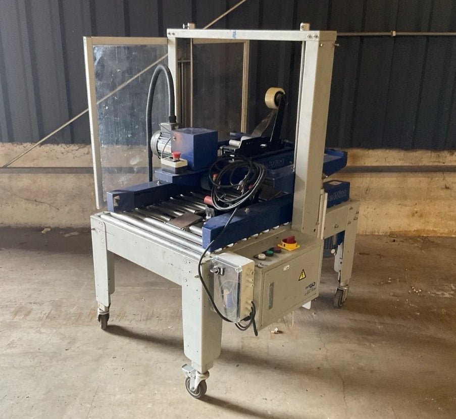 de wit dozensluitmachine, Ophalen