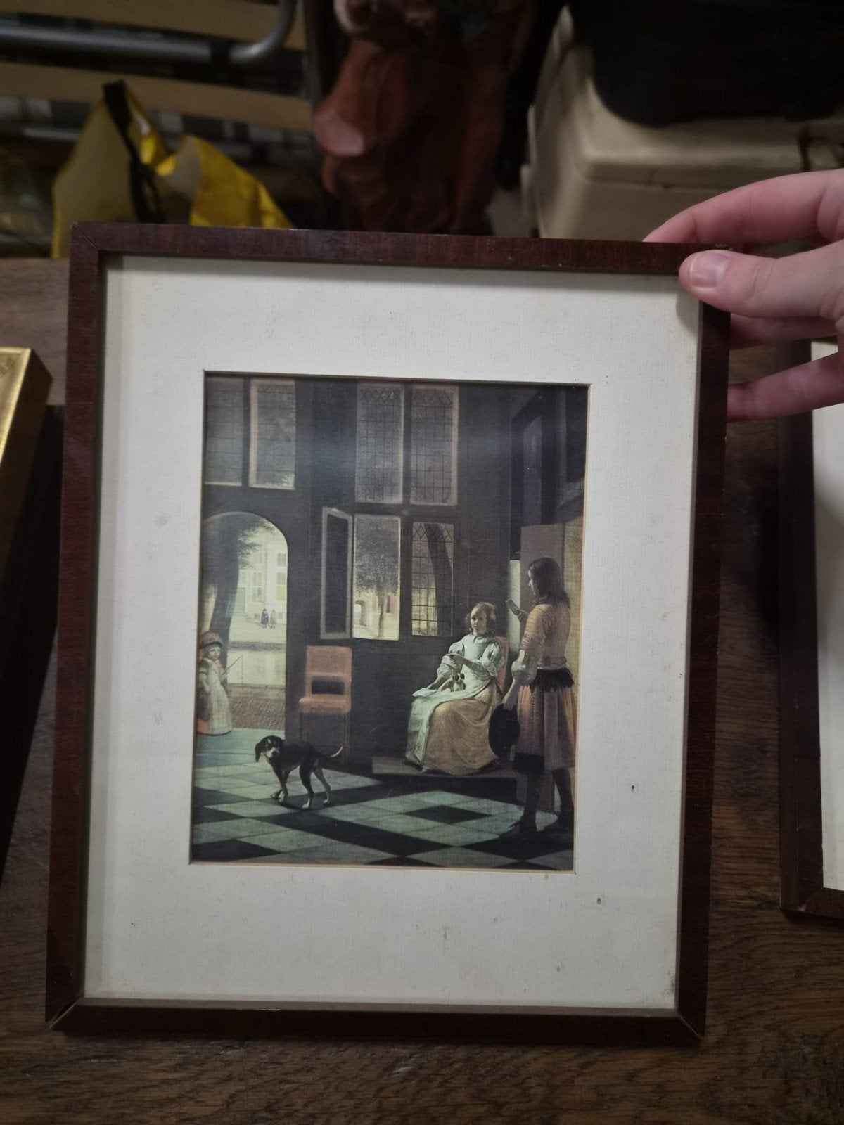 Klassiek schilderij: Interieur met figuren en hond, Ophalen