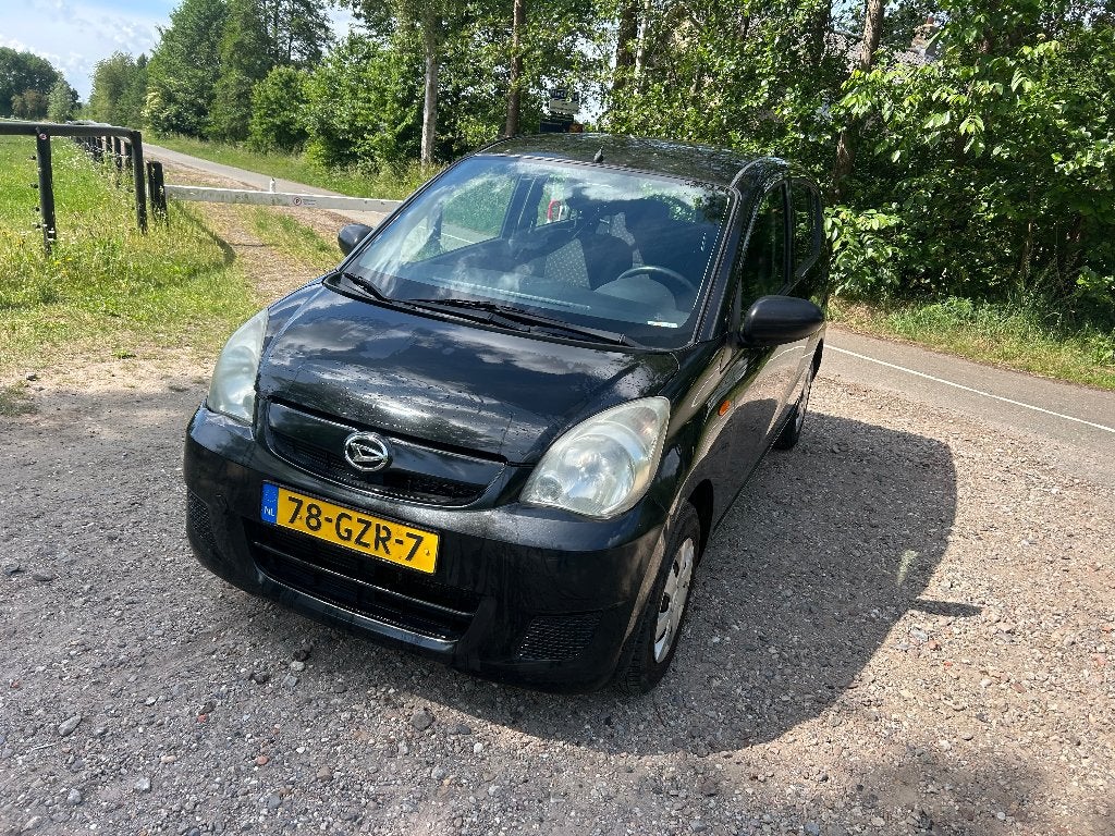 Daihatsu Cuore 1.0 5D 2008 Zwart (Lage KM, zuinige auto), Voorwielaandrijving, Stof, 600 kg, Zwart