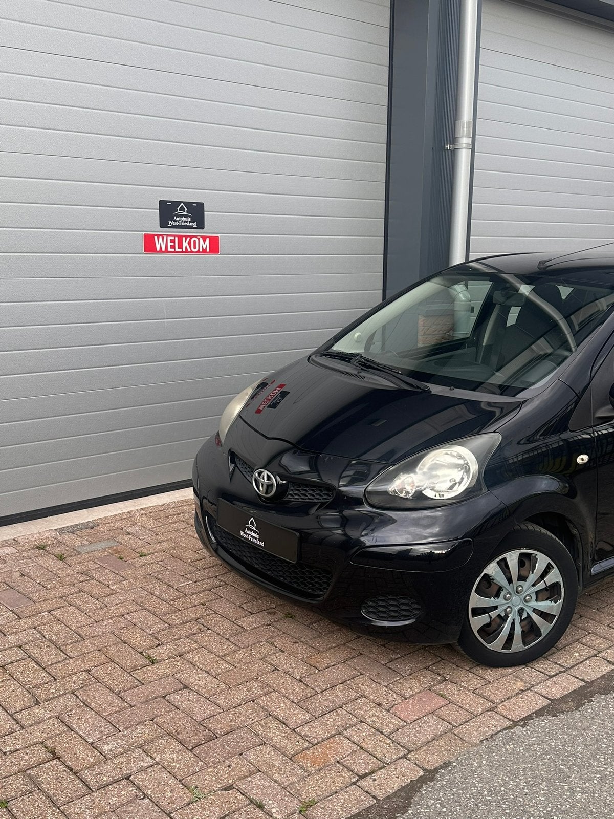 Toyota Aygo 1.0 12V Vvt-i 5DRS 2010 Zwart, Auto's, Voorwielaandrijving, 4 stoelen, Origineel Nederlands, Bedrijf