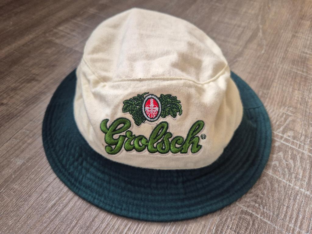 Te koop: wit/beige/groen Grolsch hoedje, Verzamelen, Biermerken, Ophalen of Verzenden, Zo goed als nieuw, Overige typen, Grolsch