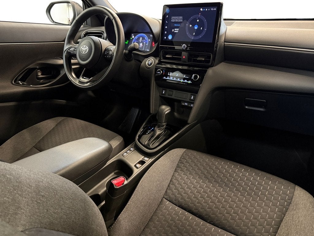 Toyota Yaris Cross 1.5 Hybrid 115 Dynamic, Auto's, Toyota, Automaat, 12 maanden, Stof, Gebruikt