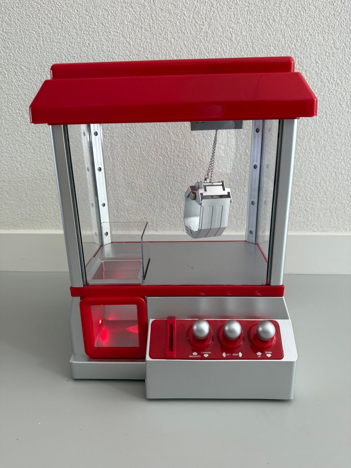 Grijpmachine, Ophalen, Zo goed als nieuw