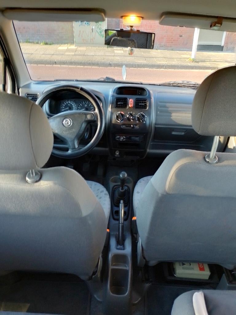 Opel Agila 1.2 I 16V 2002 NU voor €1250 euro, Voorwielaandrijving, 74 pk, 31 €/maand, 4 stoelen