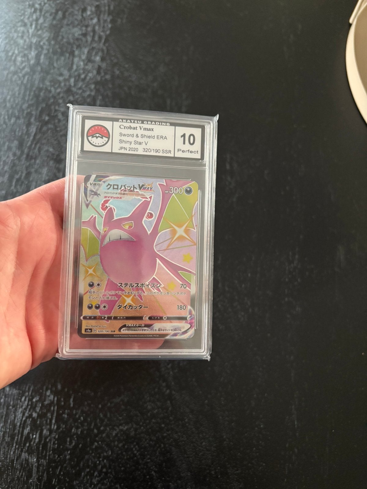 Crobat vmax rainbow grade 10, Hobby en Vrije tijd, Verzamelkaartspellen | Pokémon, Ophalen of Verzenden, Zo goed als nieuw, Meerdere kaarten