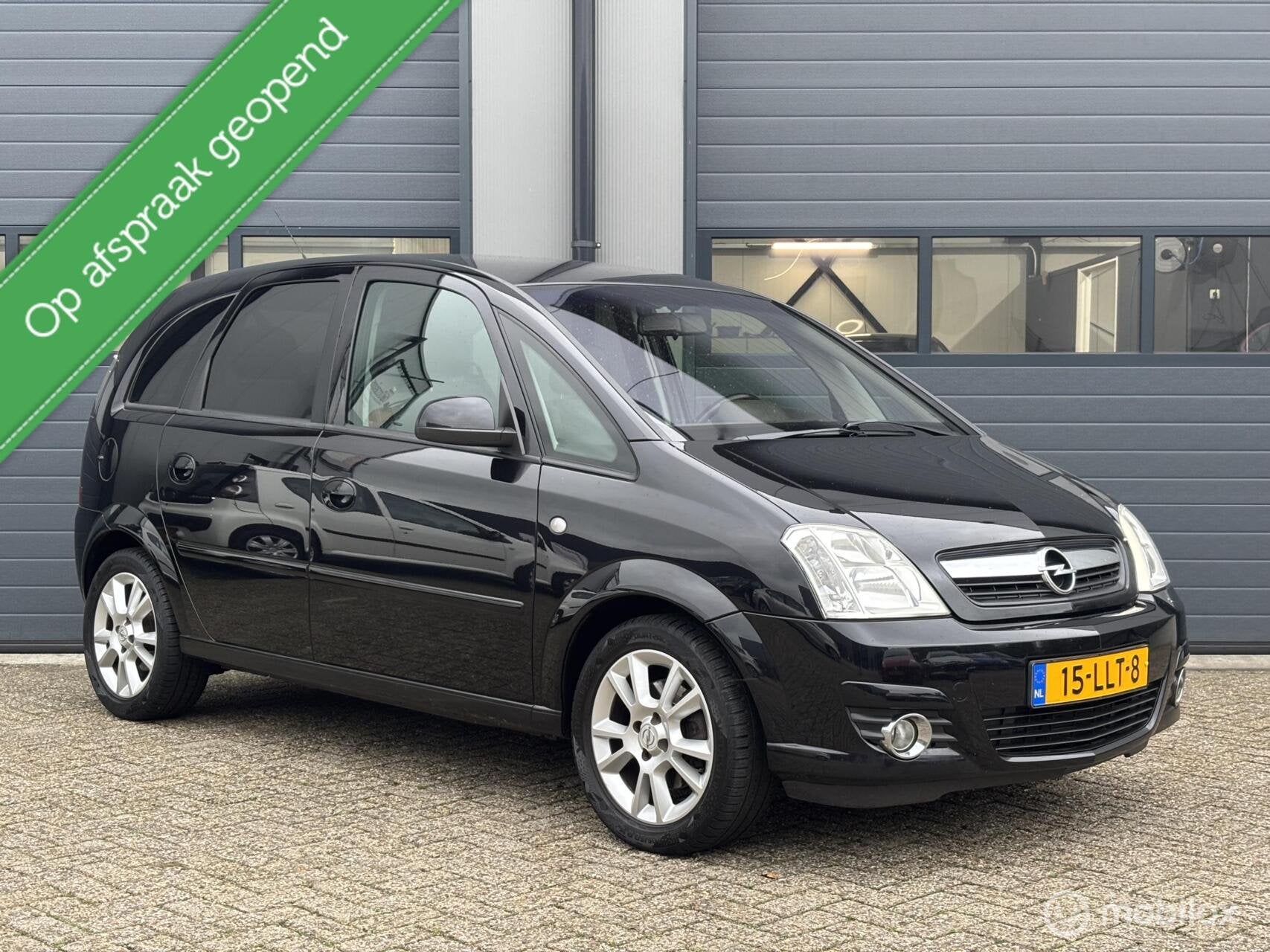 Opel Meriva 1.6-16V Cosmo Automaat Uitvoering, Auto's, Verwarmde buitenspiegels, 15 km/l, 4 cilinders, Zwart