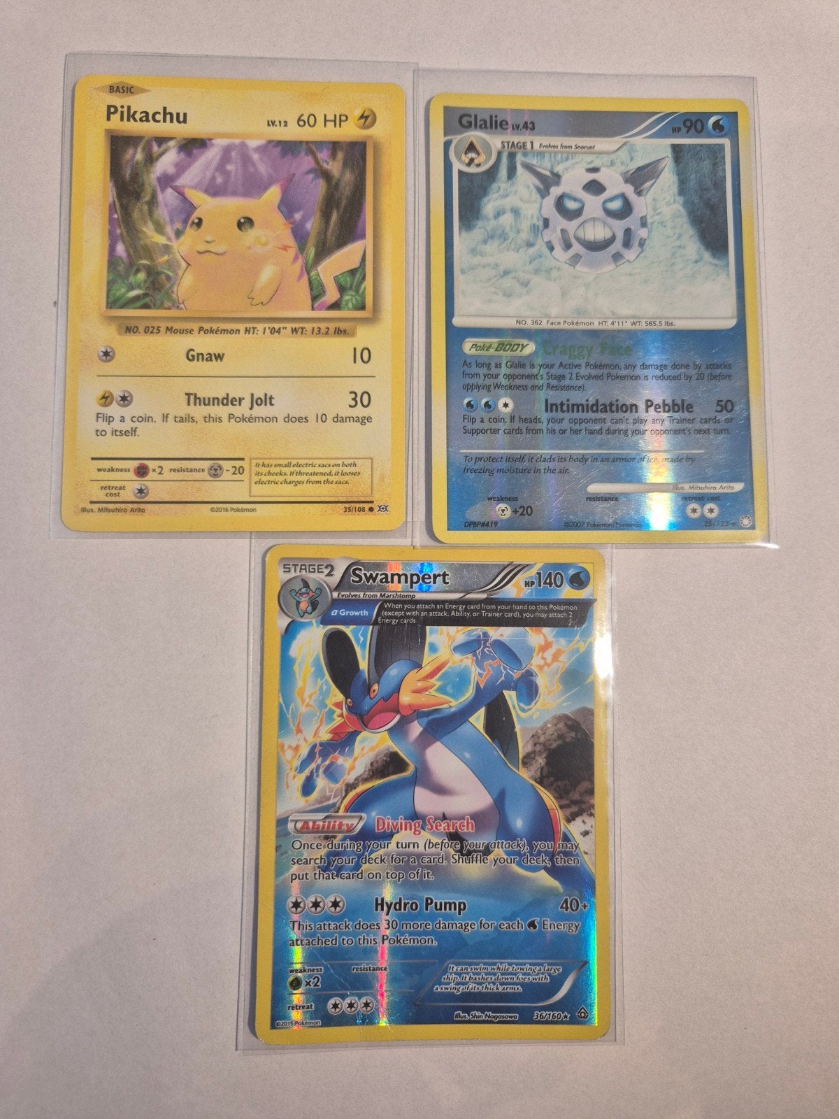 Pokémon kaarten: Swampert, Pikachu en Glalie, Hobby en Vrije tijd, Verzamelkaartspellen | Pokémon, Ophalen of Verzenden, Meerdere kaarten