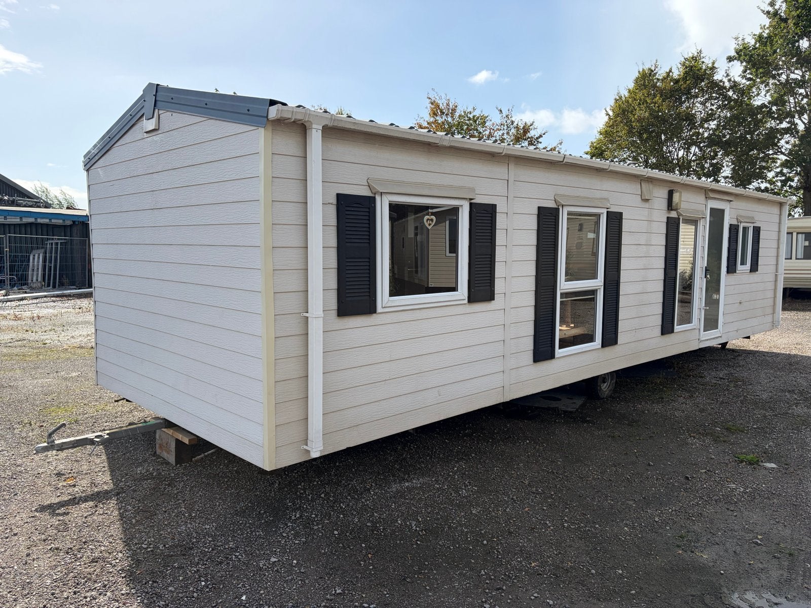 Chalet 10x3.30m kunststof buitenbekleding 3slk met transport, Tot en met 6