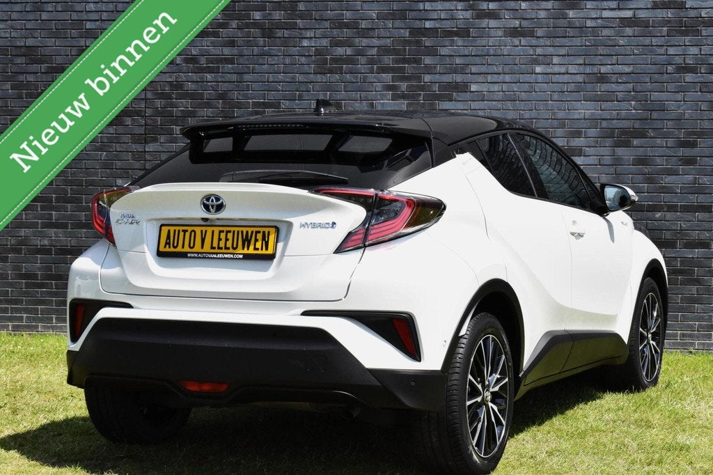 Toyota C-HR 1.8 Hybrid Executive Bi-Tone MATRIX/LED/CAMERA/V, Auto's, Euro 6, 4 cilinders, Leder, Bedrijf