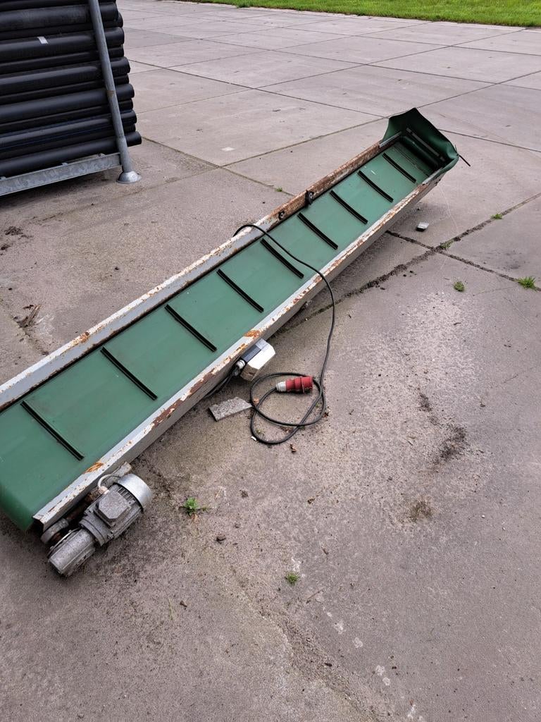 Elevator transportband, Ophalen