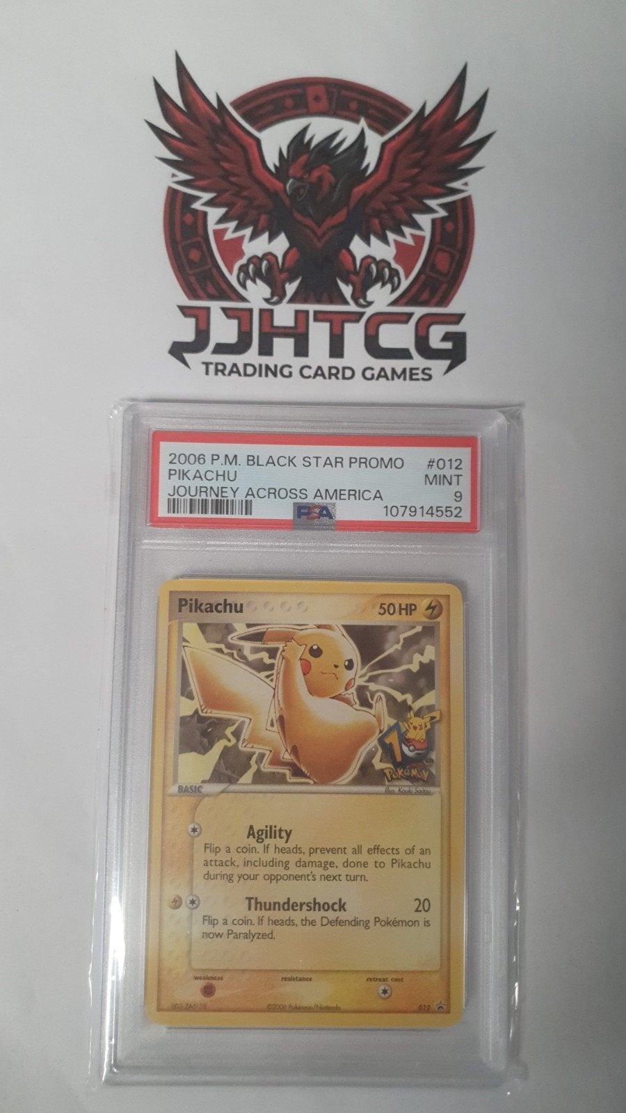 Pikachu P.M. promo 012 Journey Across America (PSA 9), Ophalen of Verzenden, Zo goed als nieuw, Losse kaart
