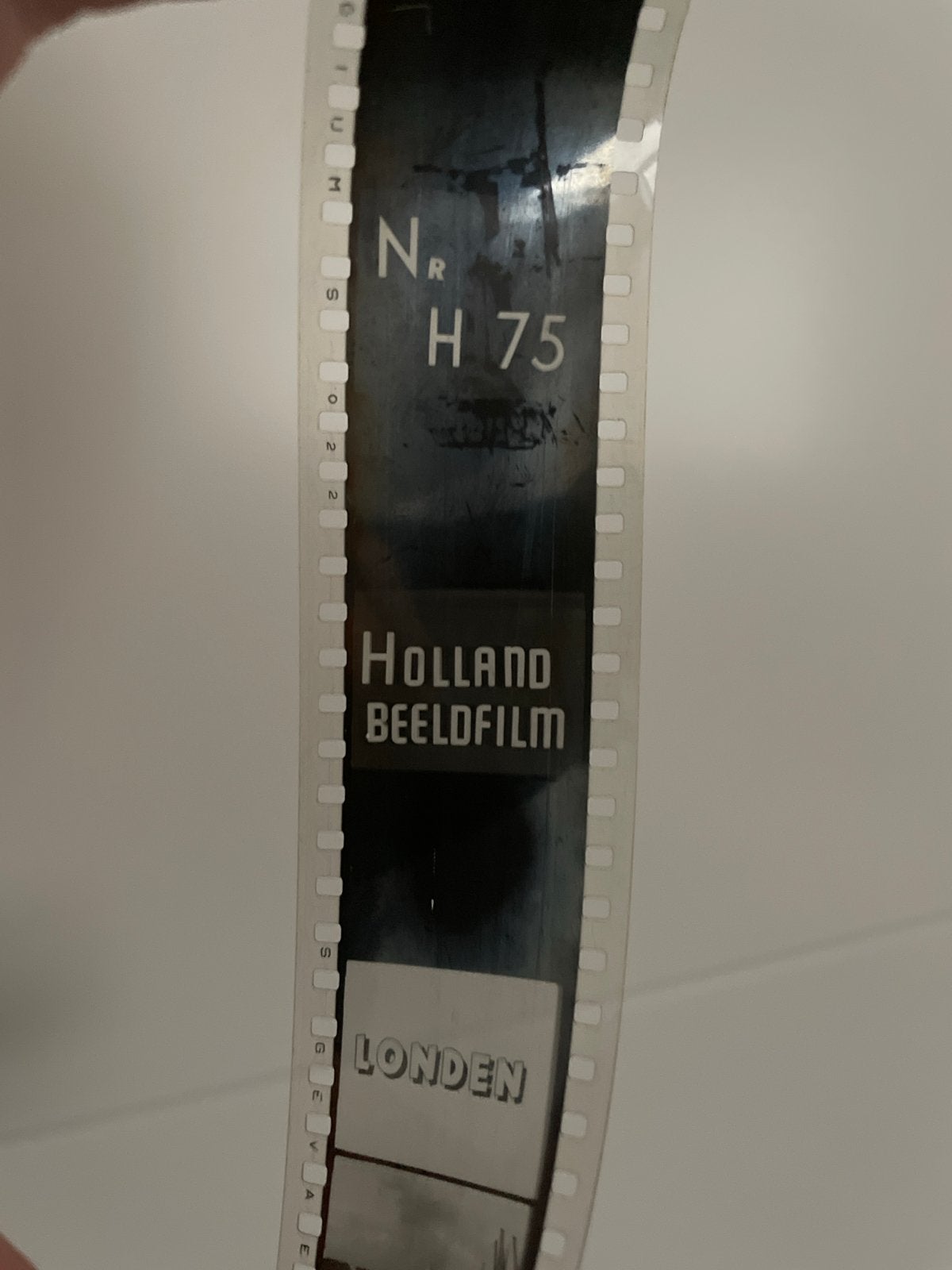 Vintage Holland Beeldfilm Londen H 75 - Zeldzame Filmstrip, Audio, Tv en Foto, Filmrollen, Ophalen of Verzenden, Accessoire