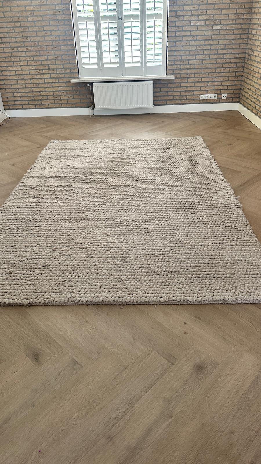 Wollen vloerkleed beige, Huis en Inrichting, Stoffering | Tapijten en Kleden, Ophalen, Beige, 200 cm of meer, Zo goed als nieuw