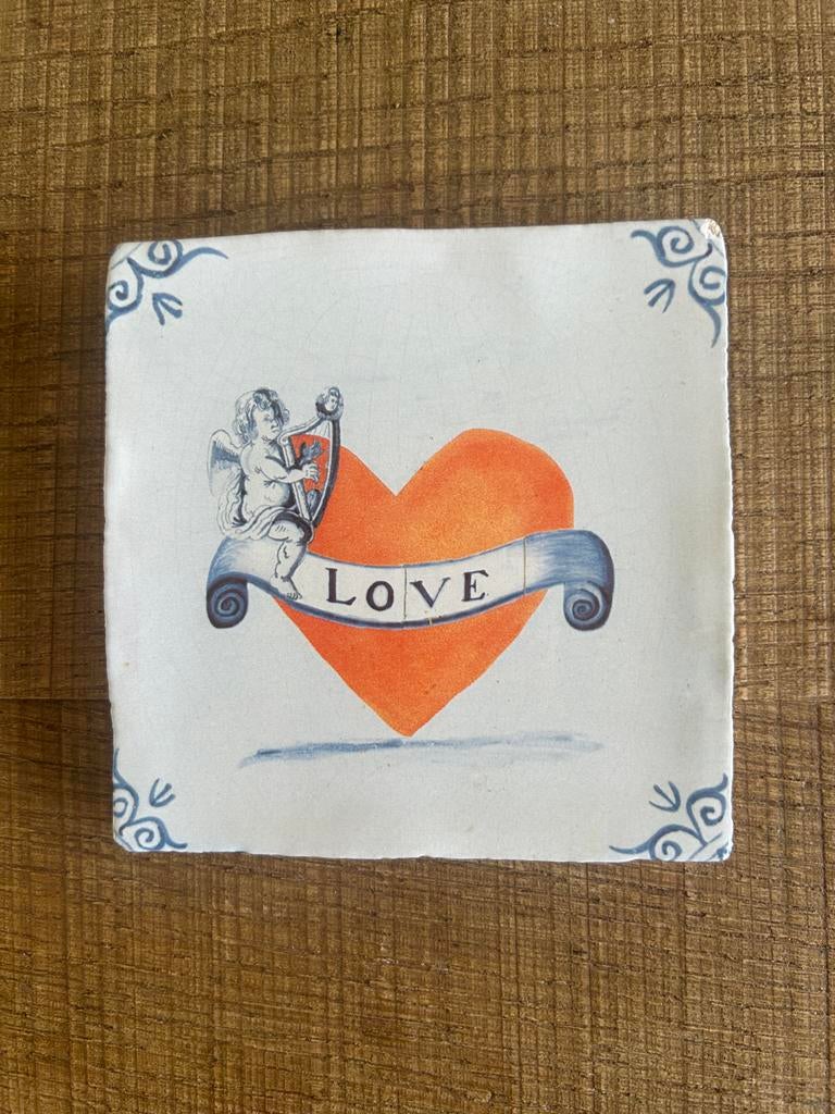 Storytiles tegel met hart en cupido, Huis en Inrichting, Woonaccessoires | Wanddecoraties, Ophalen of Verzenden, Zo goed als nieuw