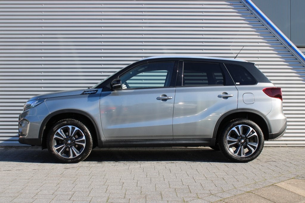 Suzuki Vitara 1.4 Boosterjet Style Automaat SmartHybrid | Tr, Auto's, Gebruikt, 4 cilinders, 129 pk, Leder en Stof