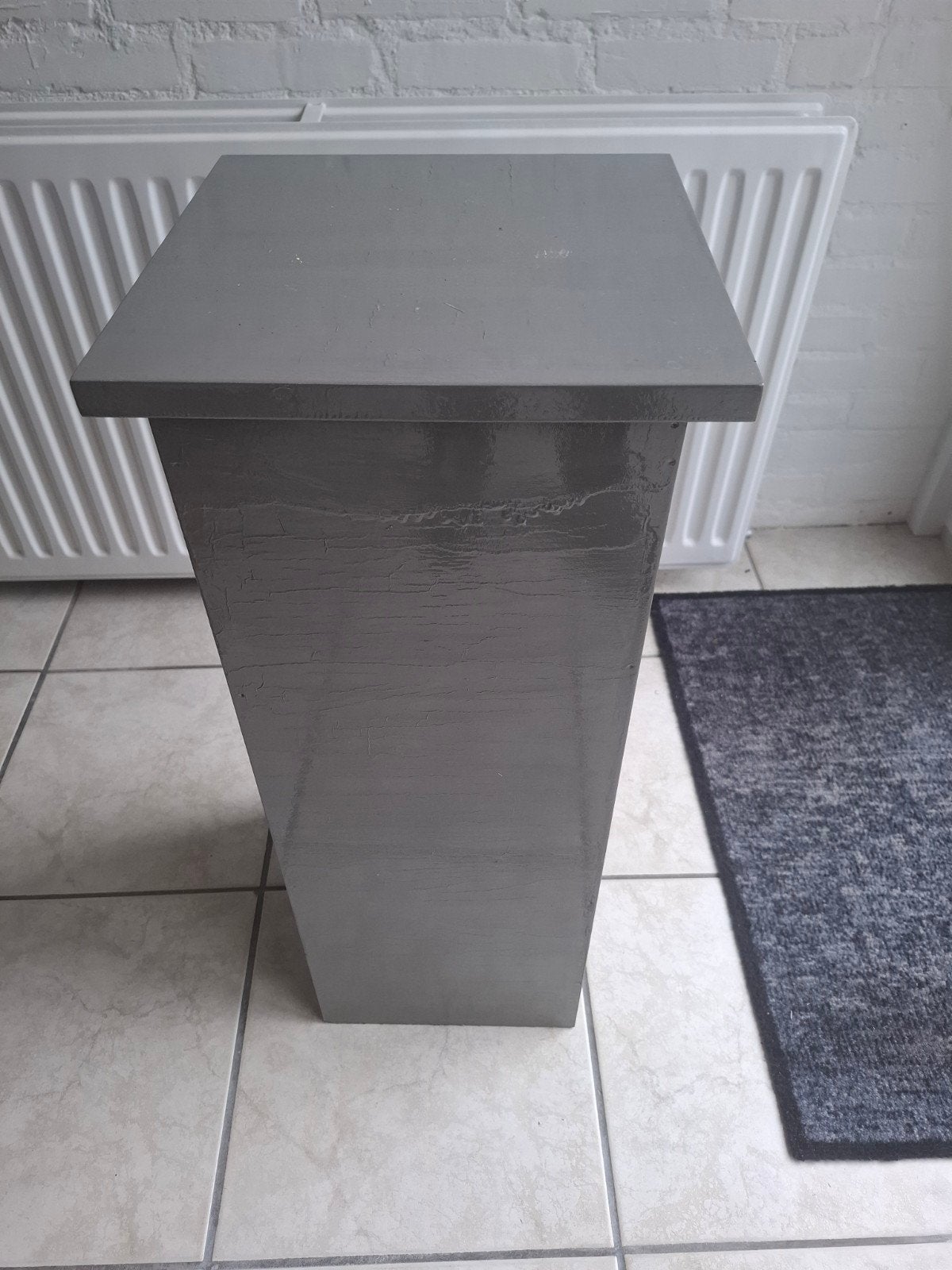 Houte sokkel, Ophalen