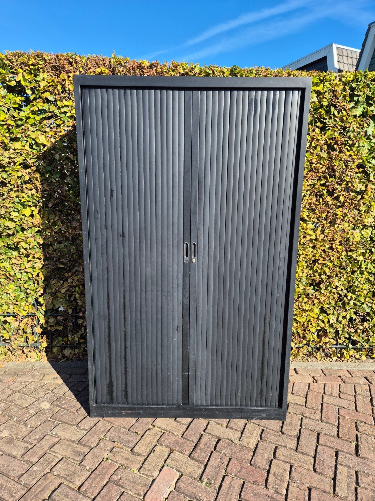 grote roldeur opbergkast kleur zwart, Ophalen, Gebruikt, 100 tot 150 cm, 150 tot 200 cm