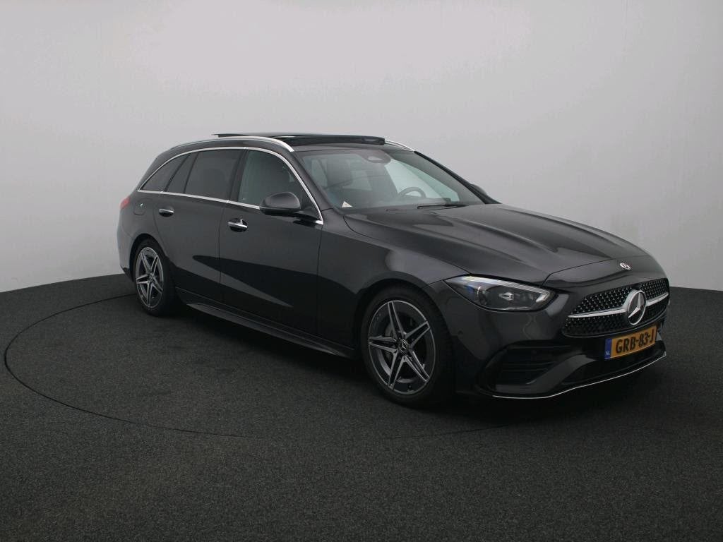 Mercedes-Benz C-Klasse C180 Estate | AMG line | Pano | Trekh, Auto's, Automaat, 1800 kg, Zwart, 4 cilinders
