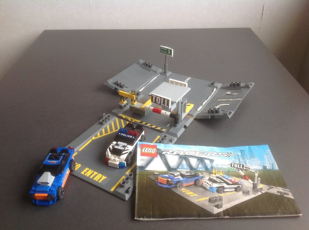 Lego racers 8197 tolpoort, 2 auto's met boekje, Lego, Compleet, Ophalen of Verzenden, Zo goed als nieuw