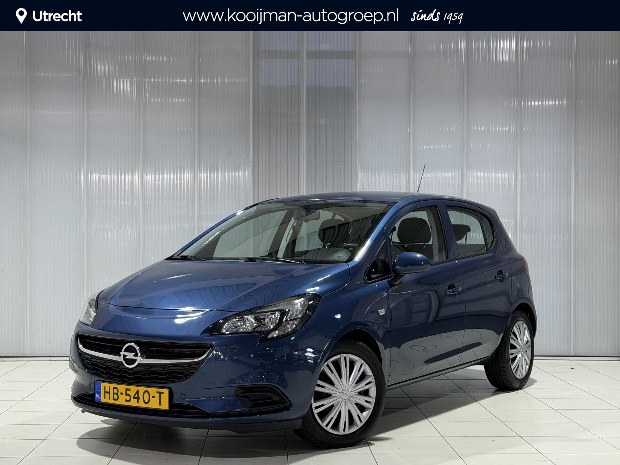 Opel Corsa 1.4 Edition Automaat , Parkeersensoren voor en ac, Dealer onderhouden, Gebruikt, 4 cilinders, Blauw