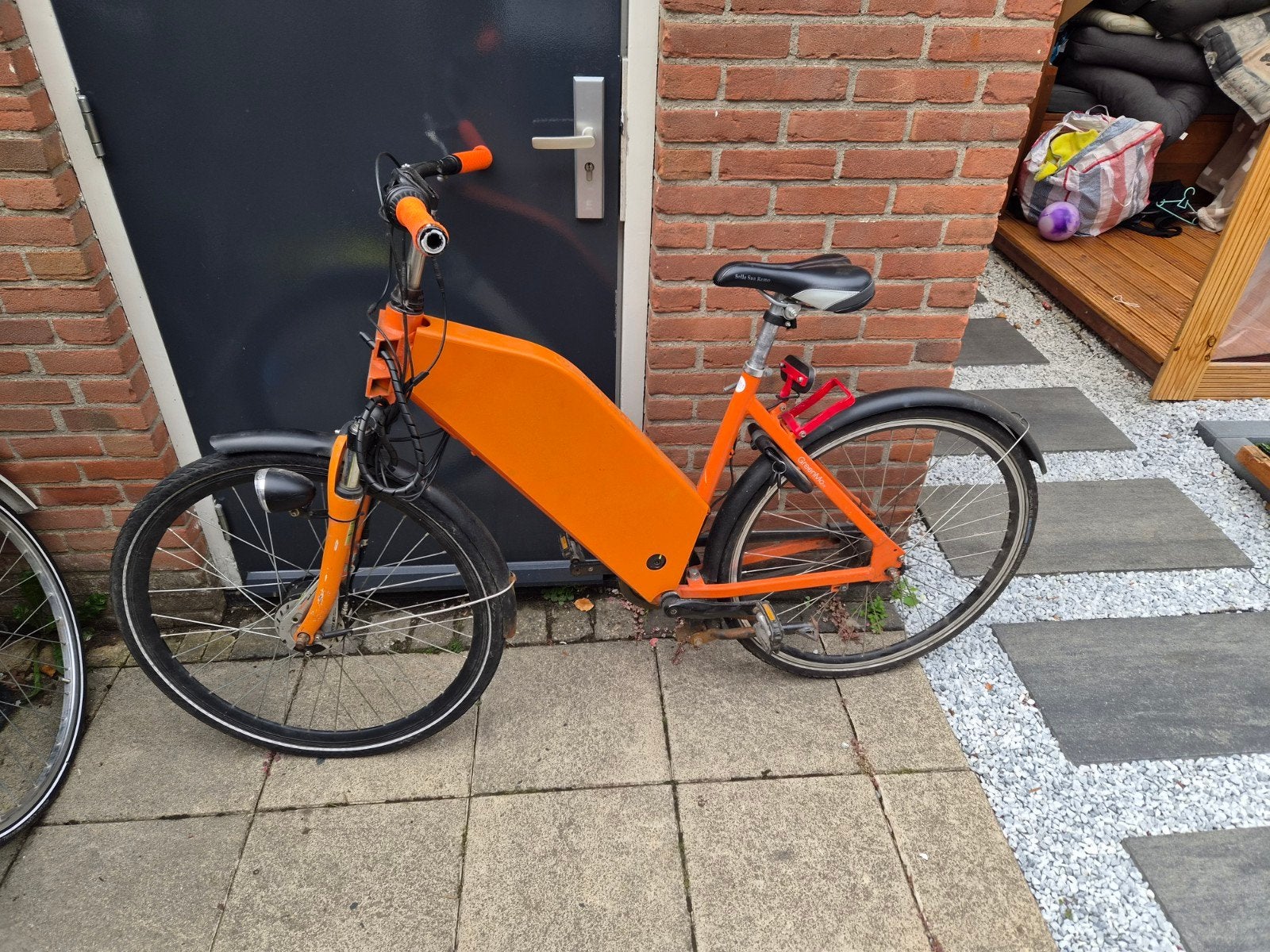 Oranje elektrische fiets met GreenMo Dorado accu, Fietsen en Brommers, Elektrische fietsen, Gebruikt, 51 tot 55 cm, 30 tot 50 km per accu