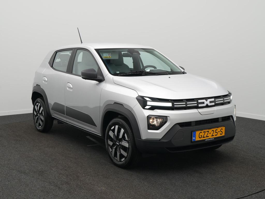 Dacia Spring Expression 65 - 27 kWh - RIJKLAARPRIJS - DEMO -, Auto's, 12 maanden, Stof, Zwart, 4 stoelen