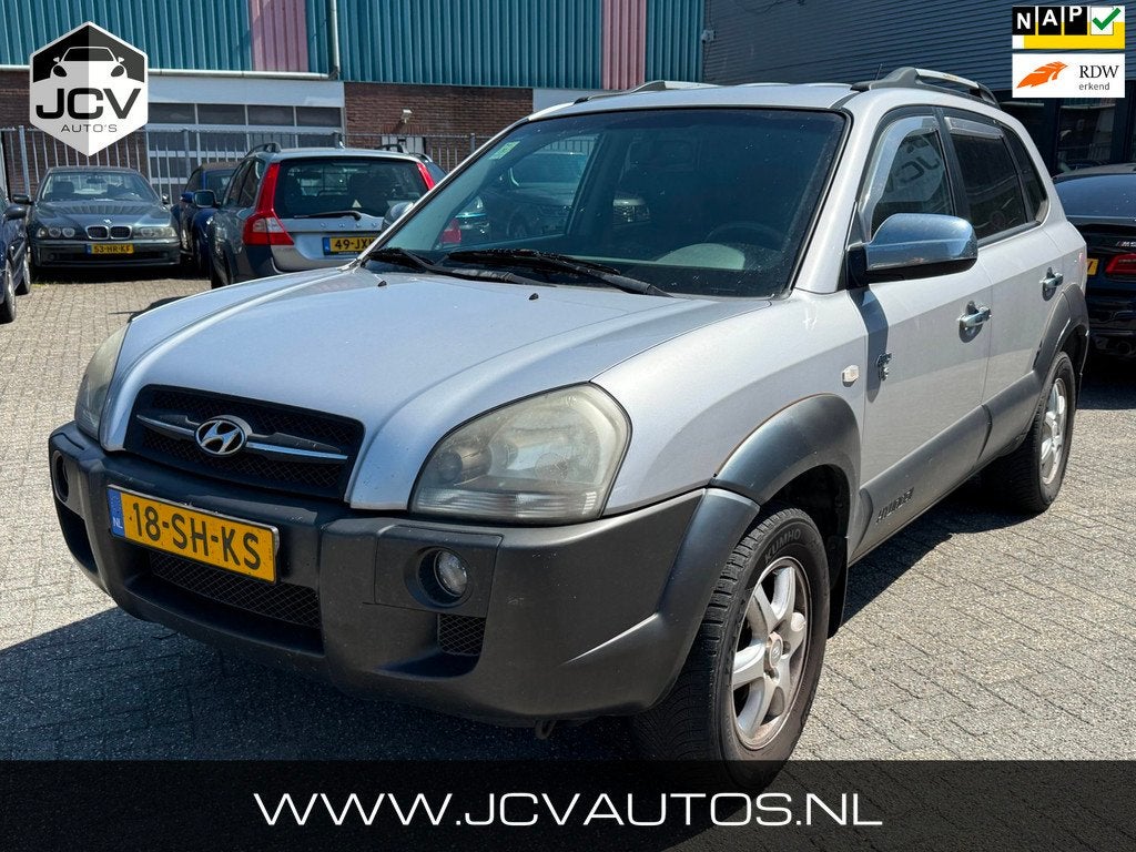 Hyundai Tucson 2.7i V6 4WD Style LEER/CLIMA/TREKHAAK, Auto's, Hyundai, Automaat, Gebruikt, 2656 cc, Bedrijf