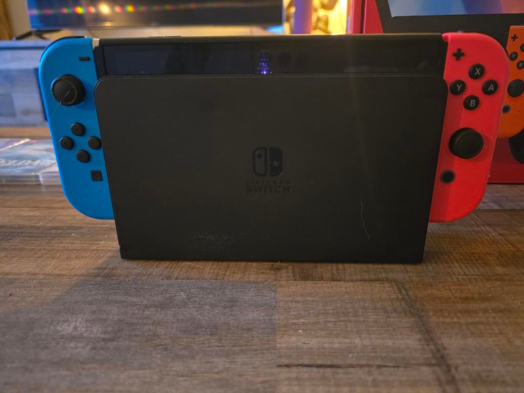 Nintendo Switch OLED met Joy-Cons en games, Switch OLED, Met games, Met 2 controllers, Ophalen of Verzenden