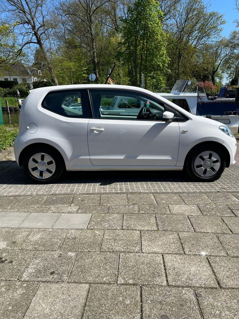 Volkswagen up! 1.0 44KW 2013 Wit APK 7-06-2027, Auto's, Voorwielaandrijving, Euro 5, Stof, 840 kg