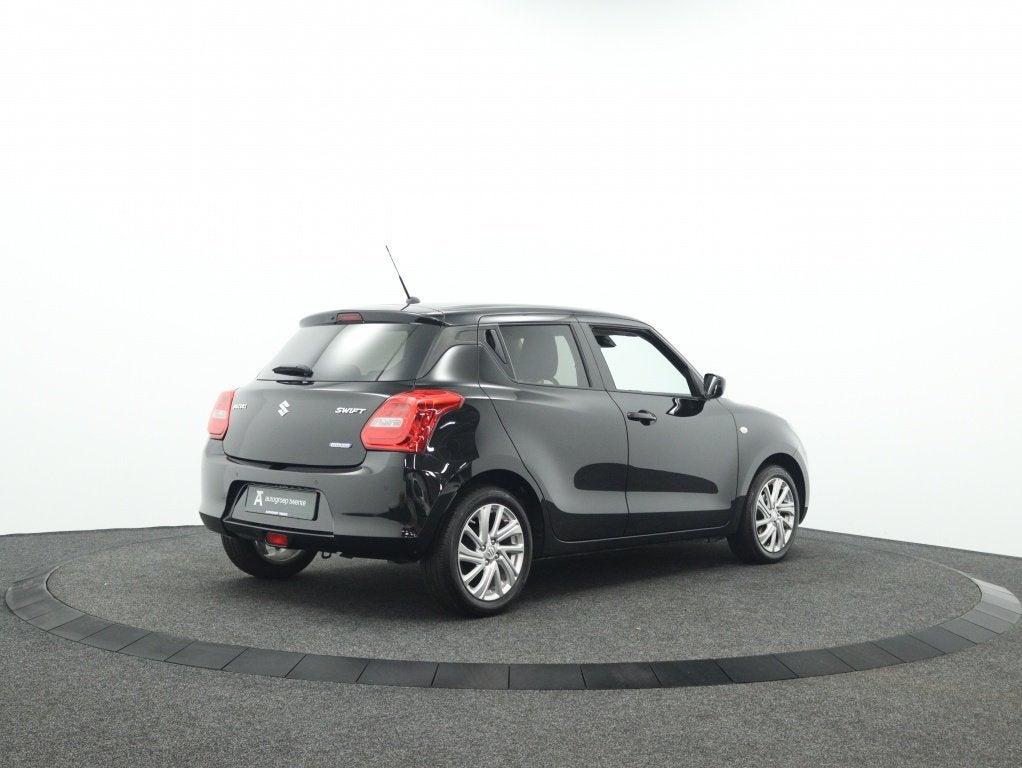 Suzuki Swift 1.2 Select SmartHybrid Automaat | Navigatie | C, Auto's, Suzuki, Stof, Gebruikt, Zwart, 4 cilinders