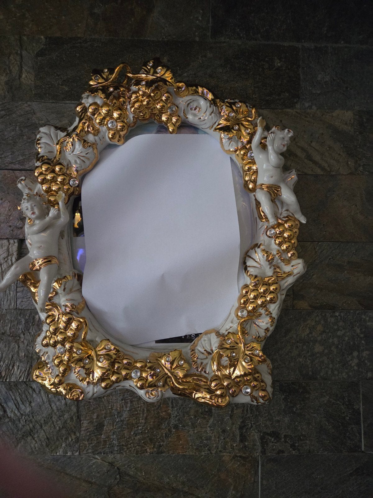 Capodimonte fotolijst, Ophalen