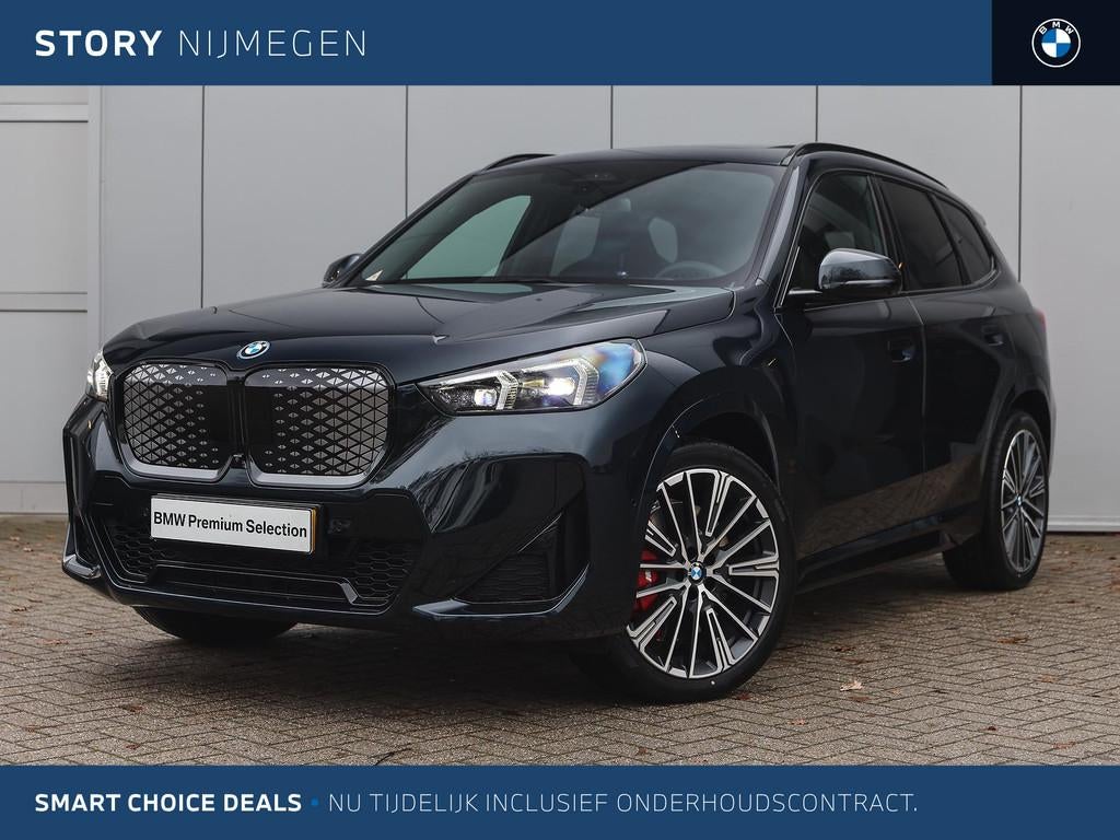 BMW iX1 eDrive20 High Executive M Sport / Panoramadak / Trek, Met garantie (alle), 24 min, Origineel Nederlands, 204 pk