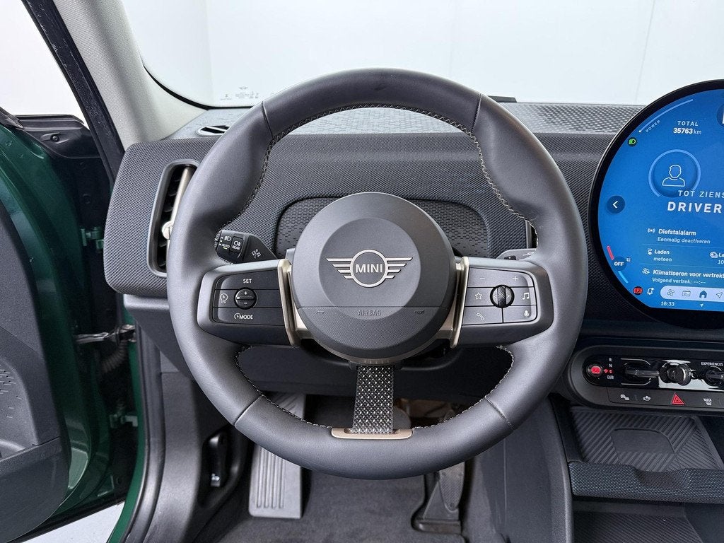 MINI Countryman E British Racing Green | Stuurverwarming | S, Auto's, Gebruikt, Countryman, Met garantie (alle), Leder en Stof