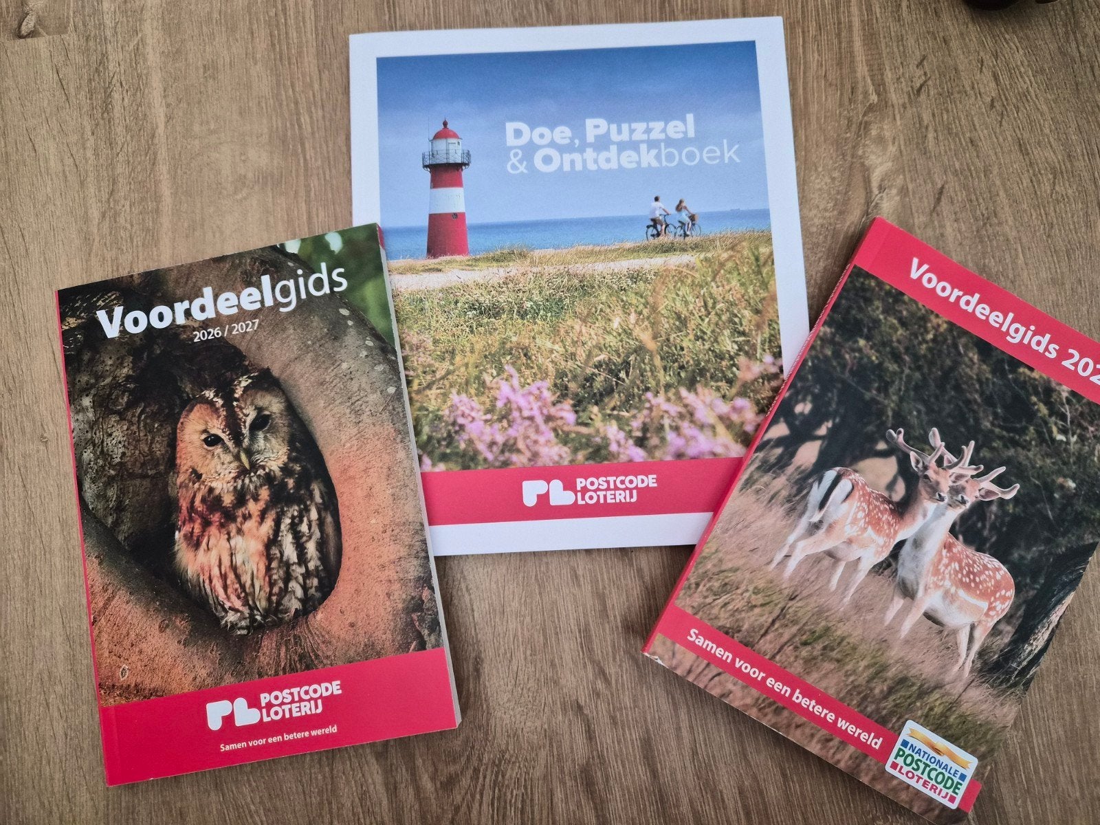 Postcode Loterij Voordeelgids en doe puzzel en ontdek boek, Ophalen of Verzenden, Zo goed als nieuw