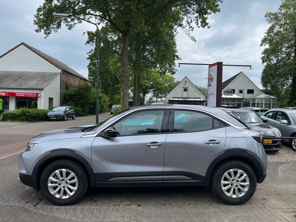 Opel MOKKA-E ELEGANCE 50-KWH (96% SOH) / ADAP. CRUISE / CARP, Auto's, Opel, 136 pk, Gebruikt, Overige modellen, Parkeersensor