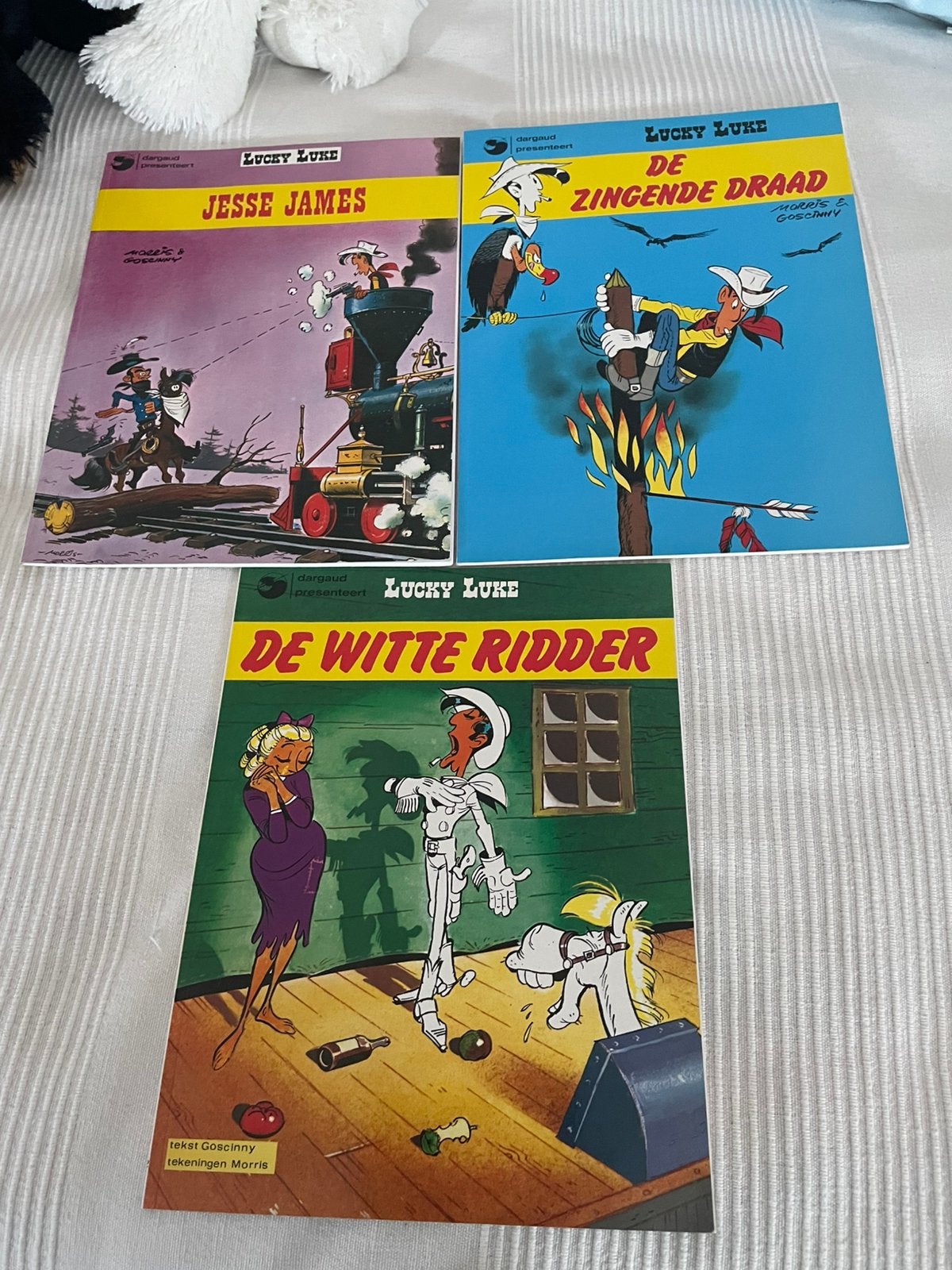 Lucky Luke stripboeken: Jesse James, Zingende Draad, Witte R, Meerdere stripboeken, Ophalen of Verzenden, Gelezen