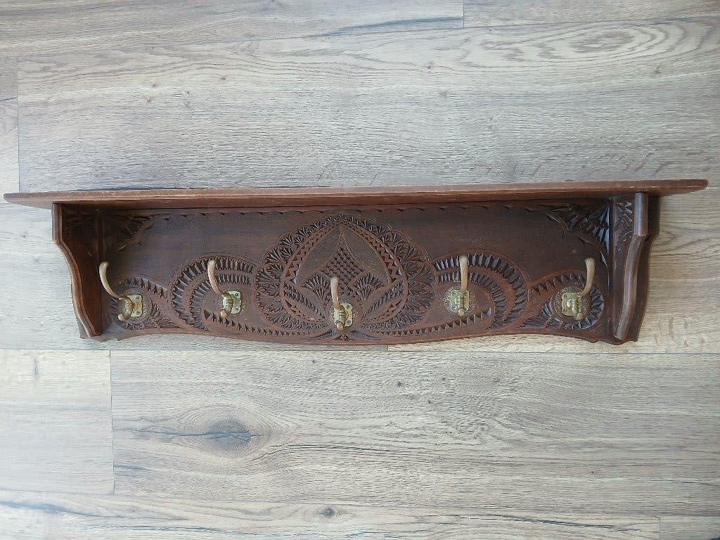 antieke houten wandkapstok, Ophalen