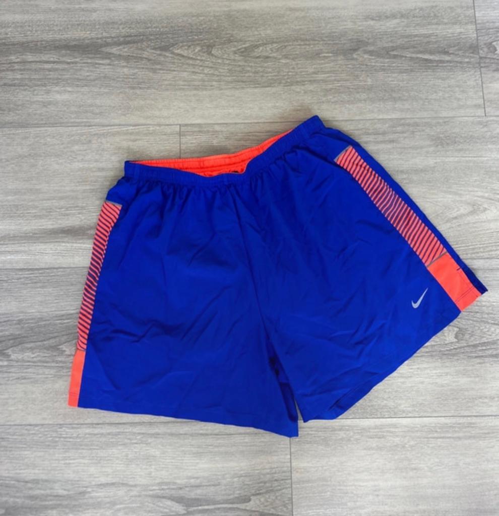 Nike Dri-Fit hardloopshorts - Blauw/Oranje, Kleding | Dames, Sportkleding, Blauw, Maat 42/44 (L), Ophalen of Verzenden, Zo goed als nieuw