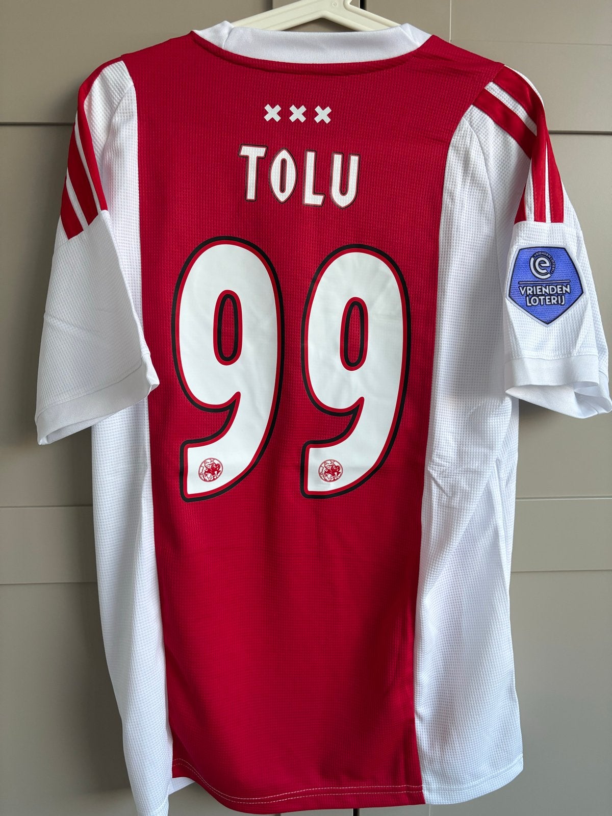 Ajax Thuisshirt Tolu #99 - Nieuw - Maat L - 26/27 Adidas, Maat 52/54 (L), Nieuw, Ophalen of Verzenden, Voetbal