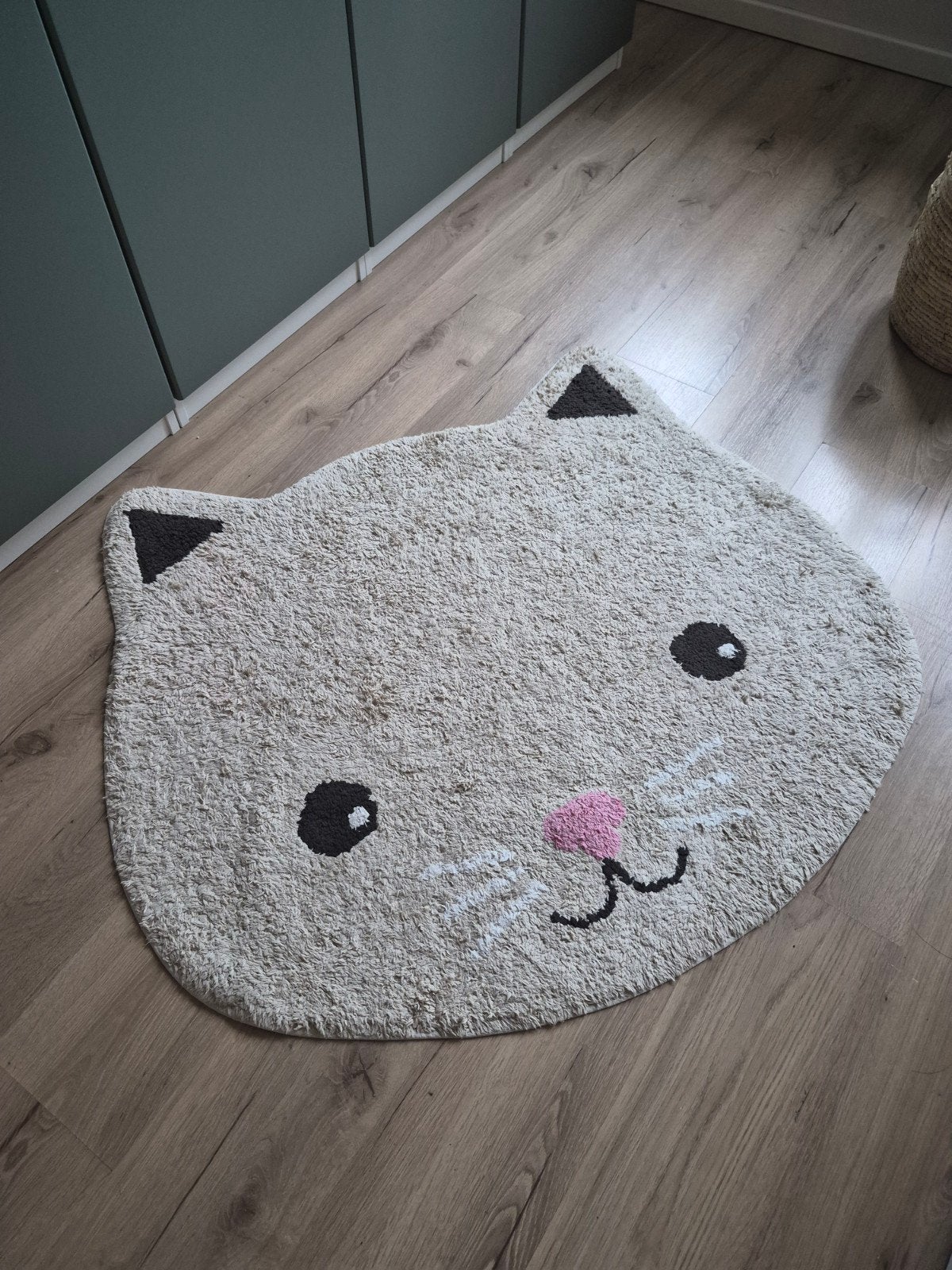 vloerkleed kat, Ophalen