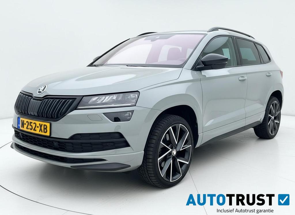 Skoda Karoq 1.5 TSI ACT Sportline Business DSG ADAP CRUISE, Auto's, Skoda, Stof, 4 cilinders, 19 km/l, SUV of Terreinwagen